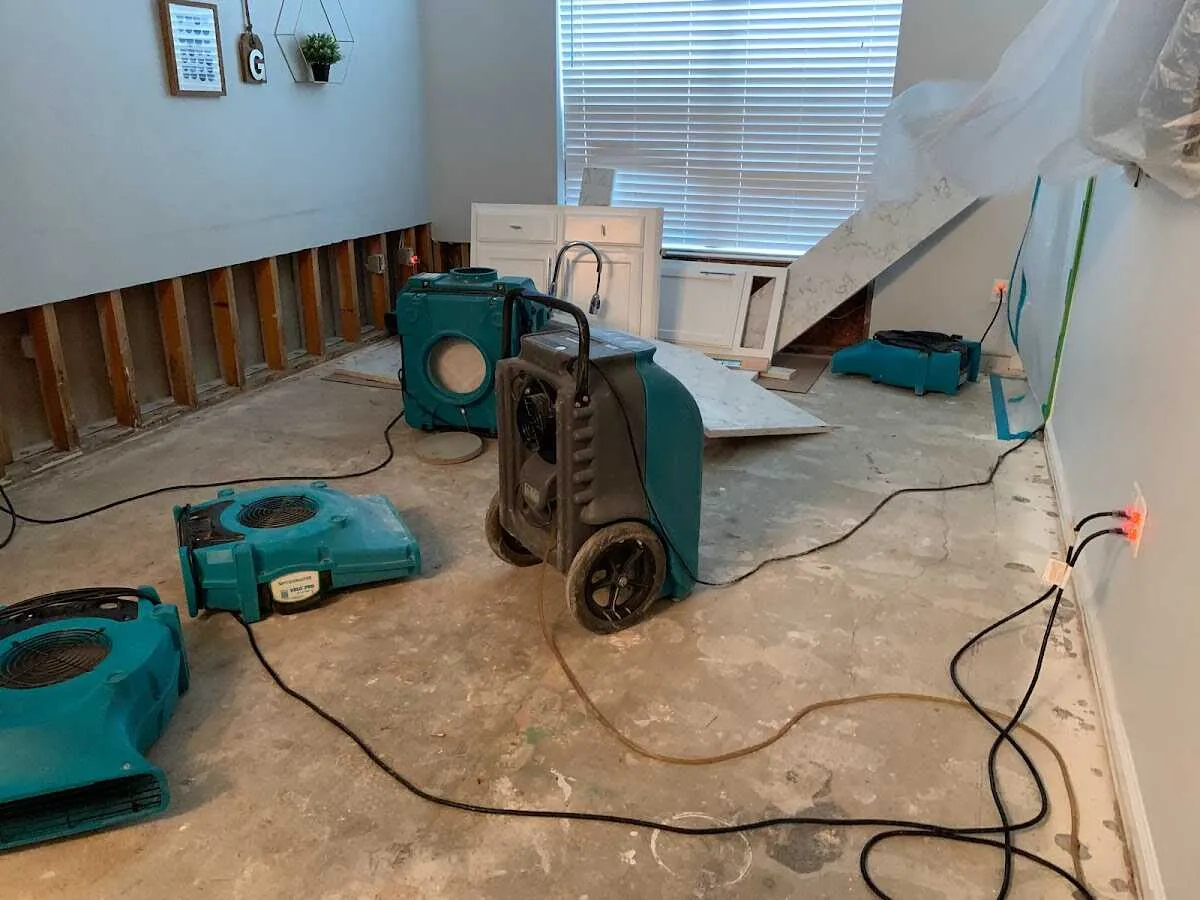 Dehumidifier in flood-cut room for Water Damage Restoration in Holland